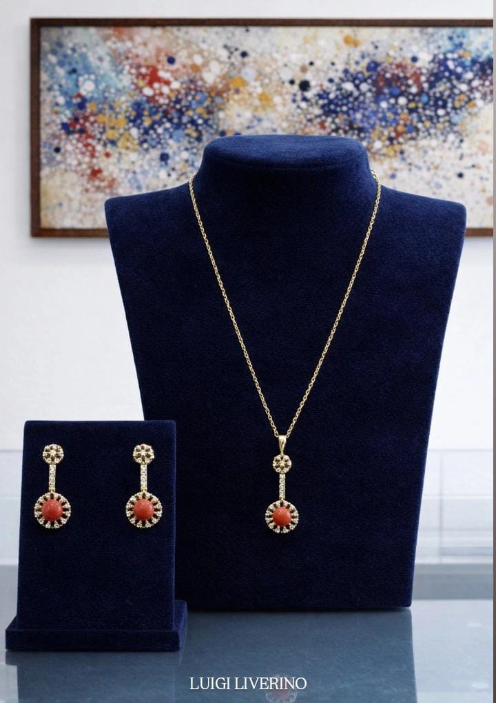 Completo collier e orecchini in argento dorato con corallo