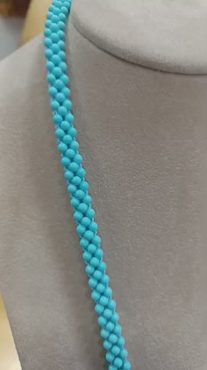 Laccio tessito di pasta di turchese